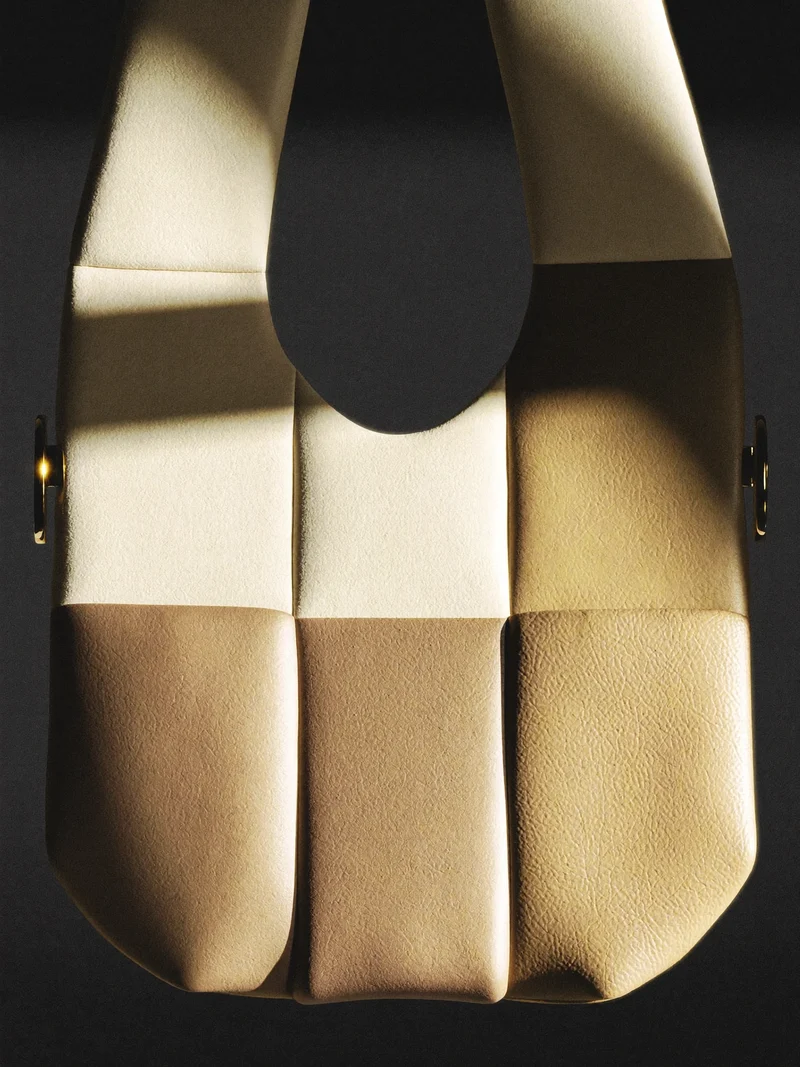 Studio illustrato di accessorio con texture e blocchi di colore.